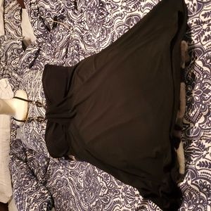 Vintage black formal dress with a tie black and sequin necklace type design.